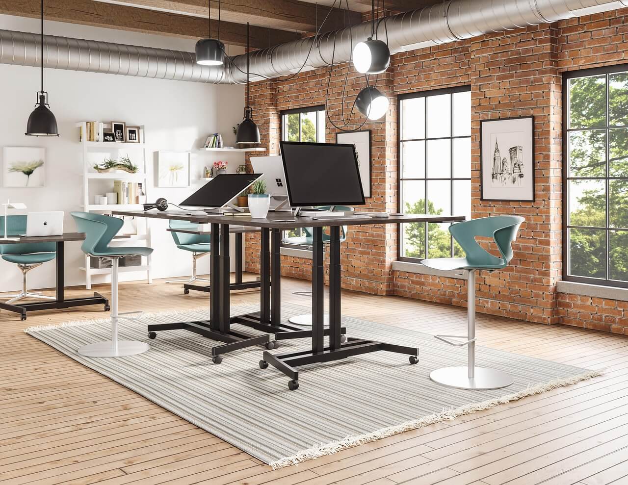 Modern open-plan office with standing desks and ergonomic chairs